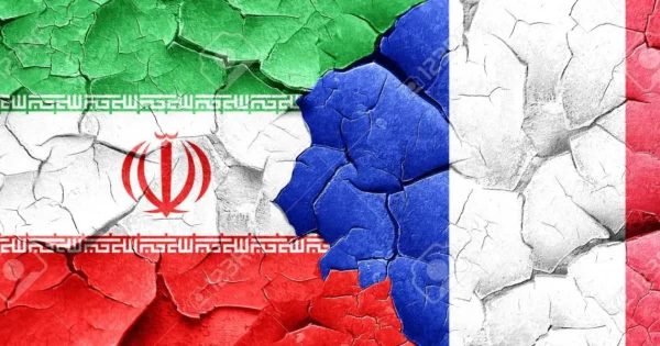 image-58373120-iran-flag-with-france-flag-on-a-grunge-cracked-wall