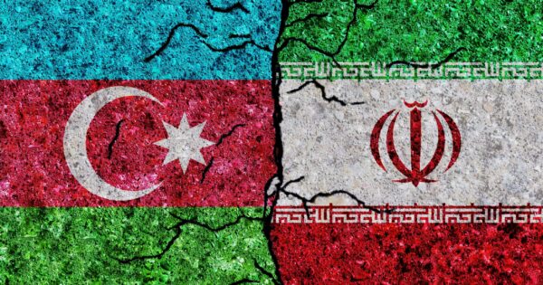 image-iran-and-azerbaijan-painted-flags-on-a-wall-with-grunge